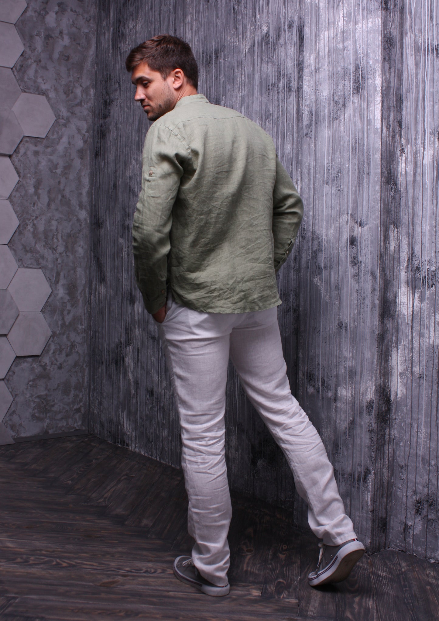 Olive color shirt made of natural linen with a stand-up collar and long sleeves