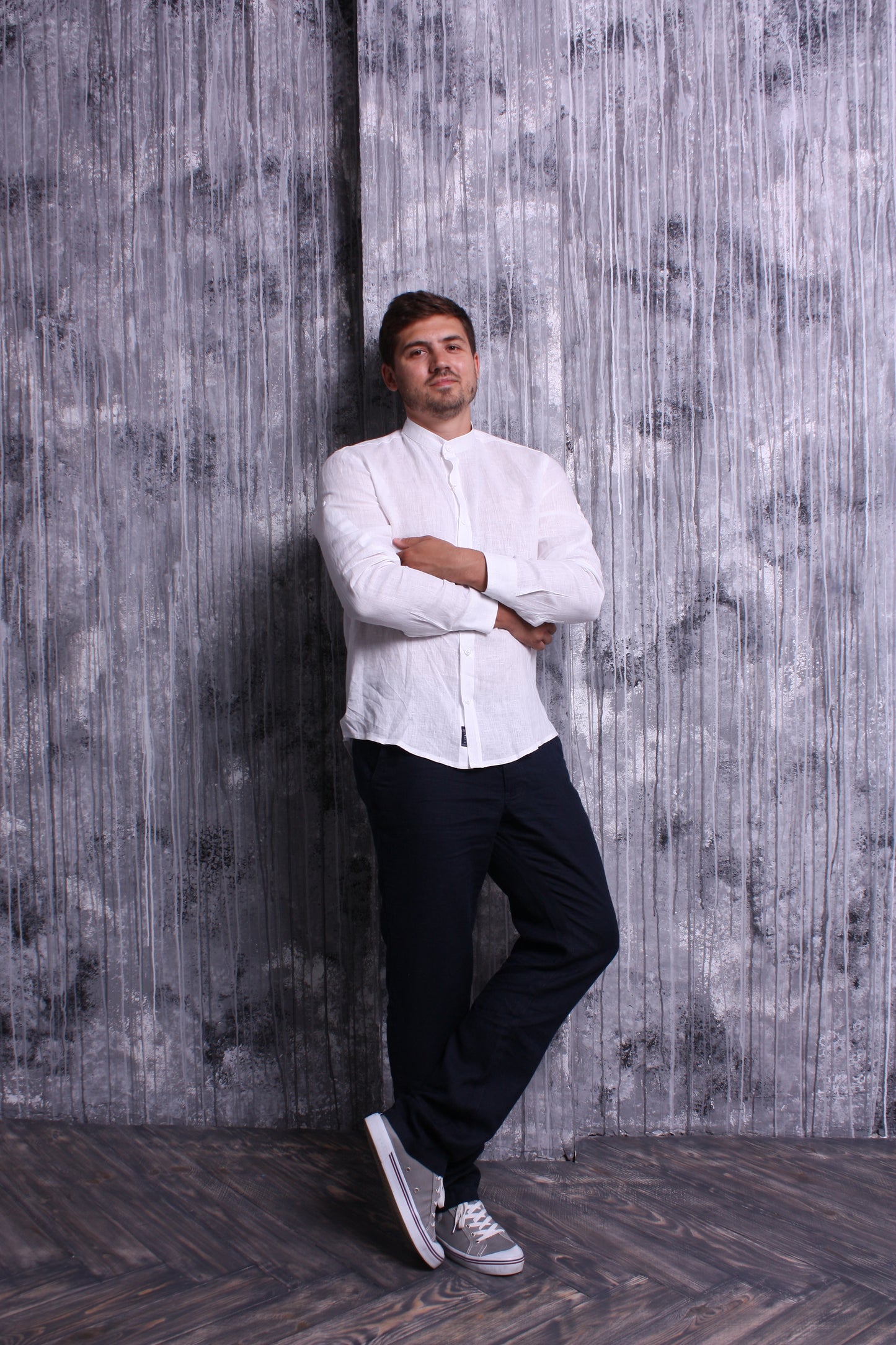 White shirt made of natural linen with a stand-up collar and long sleeves