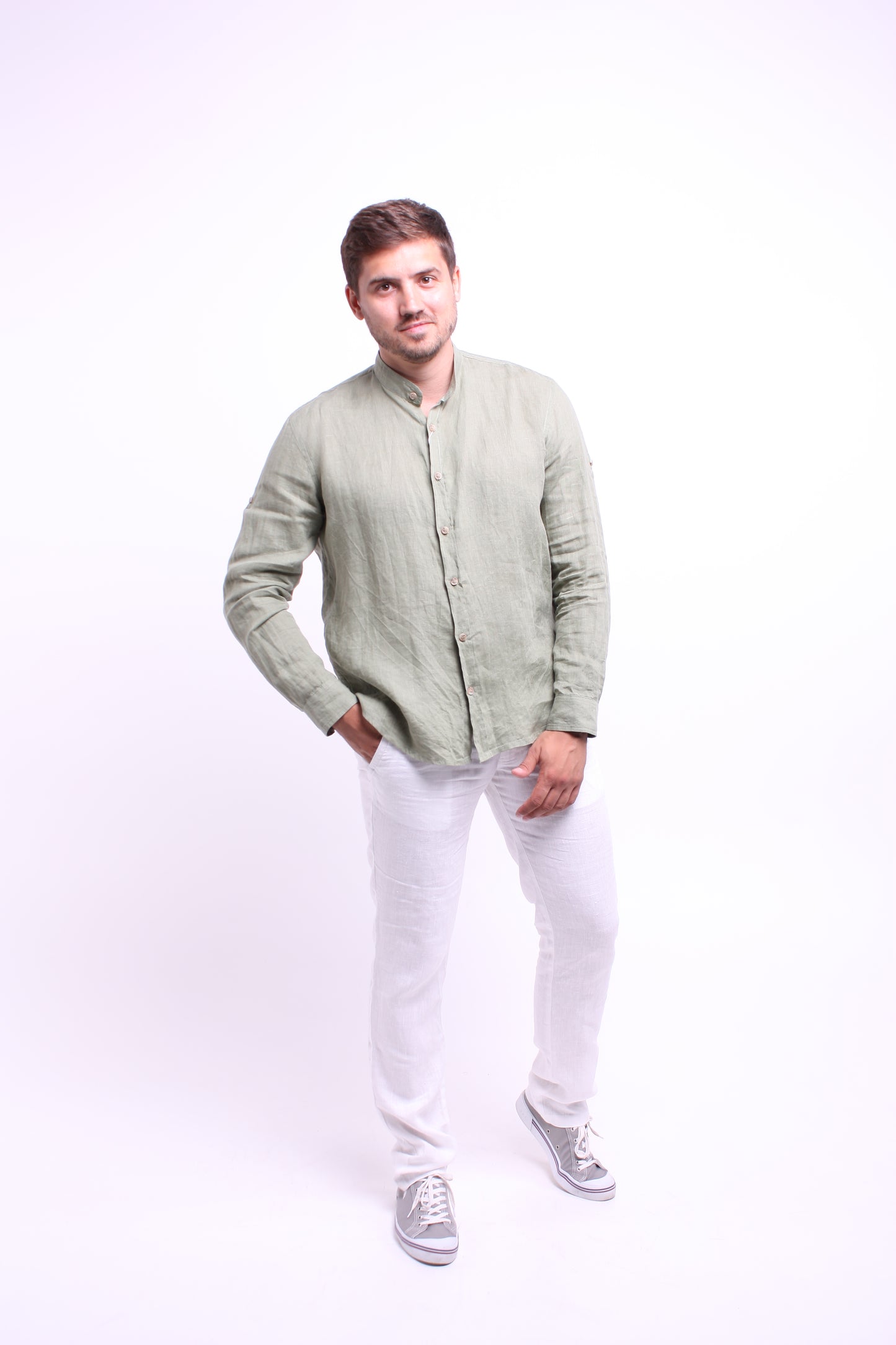 Olive color shirt made of natural linen with a stand-up collar and long sleeves