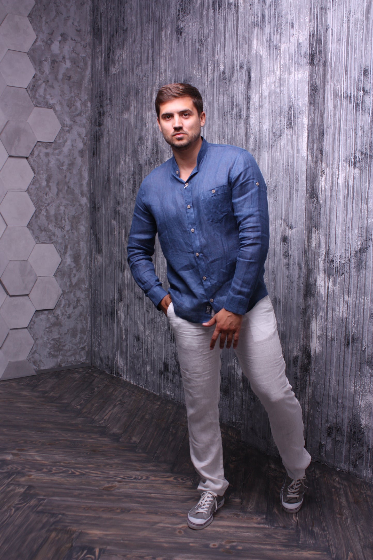 Indigo color shirt made of natural linen with a stand-up collar and long sleeves