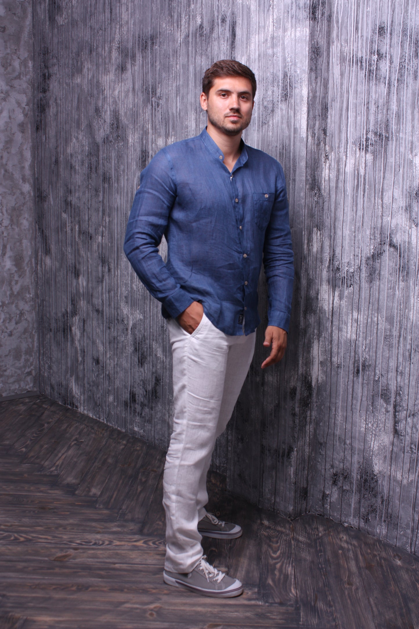 Indigo color shirt made of natural linen with a stand-up collar and long sleeves