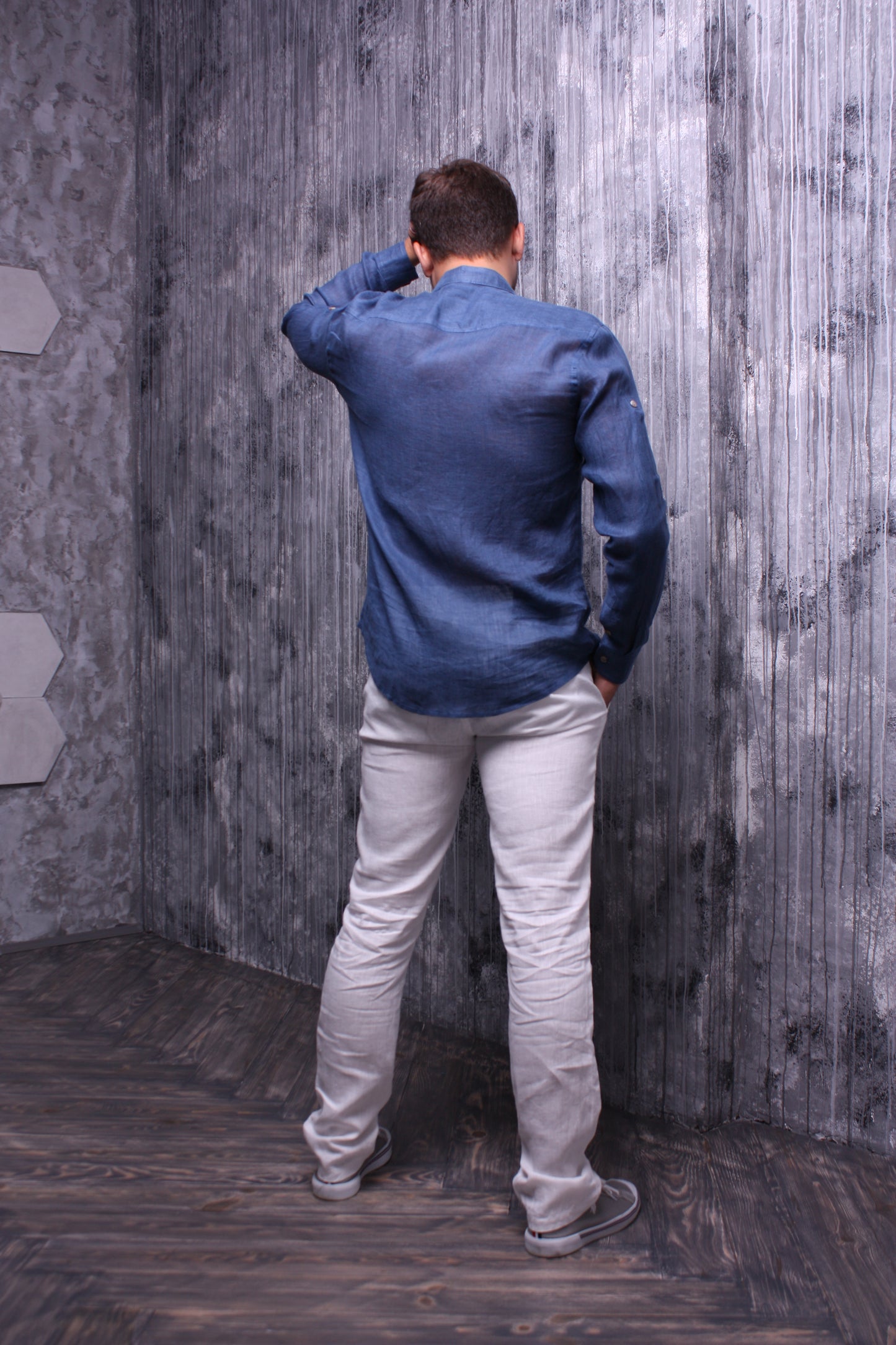 Indigo color shirt made of natural linen with a stand-up collar and long sleeves