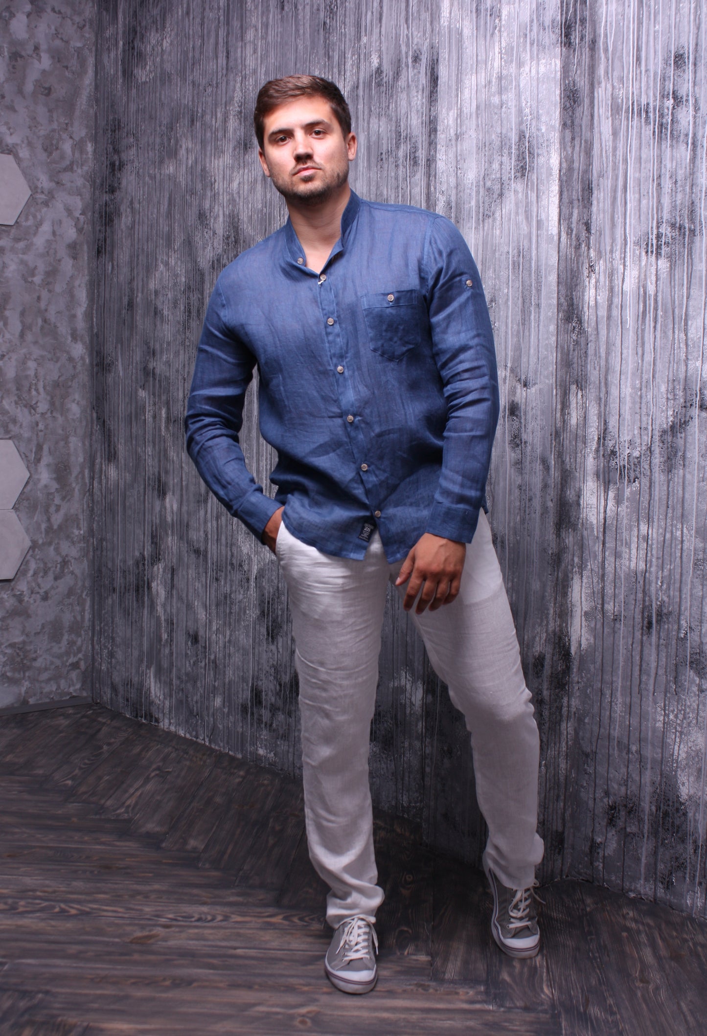 Indigo color shirt made of natural linen with a stand-up collar and long sleeves